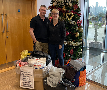 Spectra staff provide the gift of warmth at Christmas