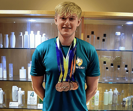 Spectra helps local swimmer aim for gold in Tokyo