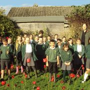 Spectra help local school create remembrance field of poppies
