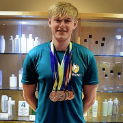 Spectra helps local swimmer aim for gold in Tokyo